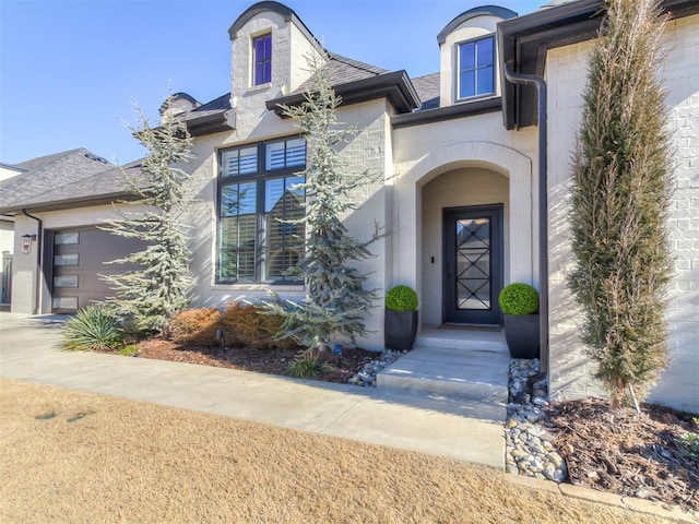 property entrance with a garage