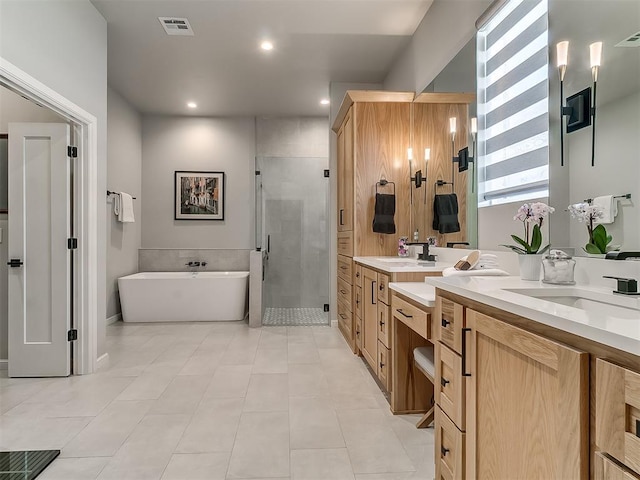 bathroom with vanity, shower with separate bathtub, and tile patterned floors