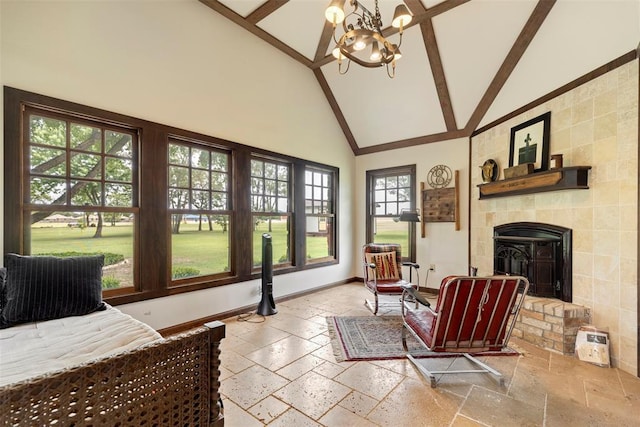 sunroom / solarium with a chandelier and vaulted ceiling