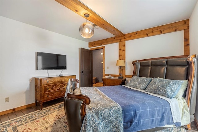 bedroom with hardwood / wood-style flooring