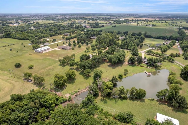 aerial view with a water view and a rural view