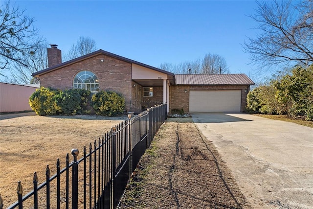 ranch-style house featuring a garage