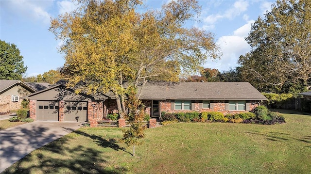 single story home with a garage and a front yard