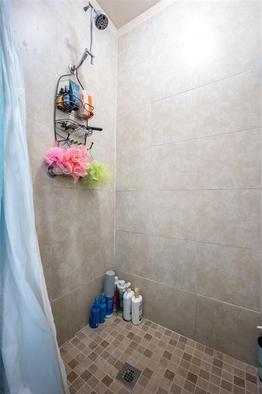 bathroom featuring walk in shower