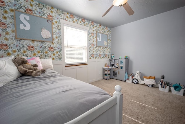 bedroom featuring ceiling fan and light colored carpet