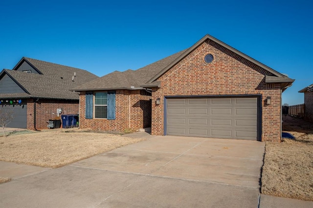 ranch-style home featuring a garage