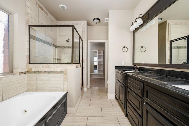 bathroom with vanity and plus walk in shower