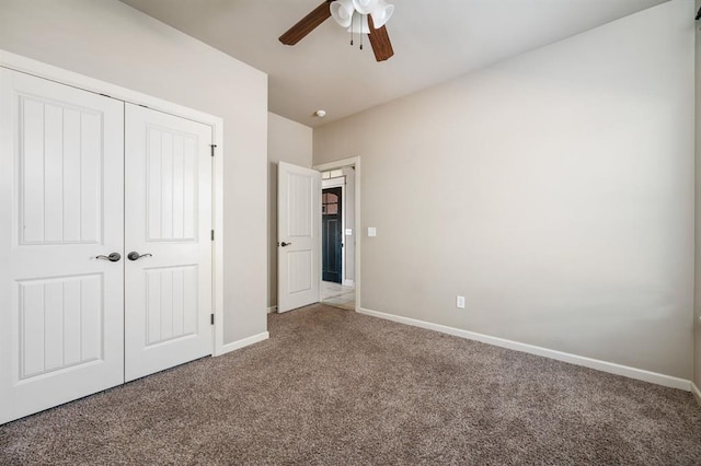 unfurnished bedroom featuring ceiling fan, carpet floors, and a closet