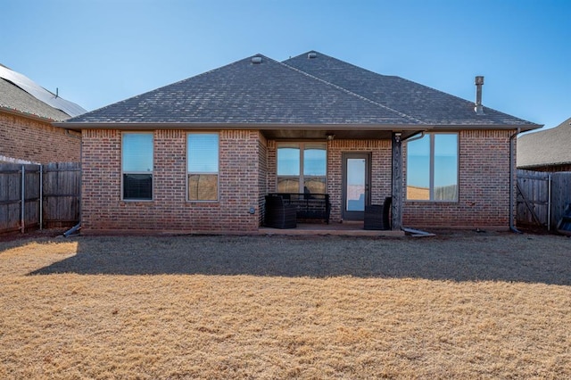 back of house with a patio area