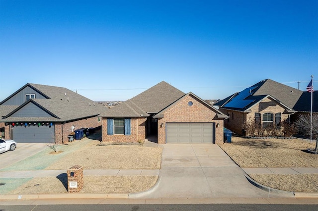 single story home featuring a garage