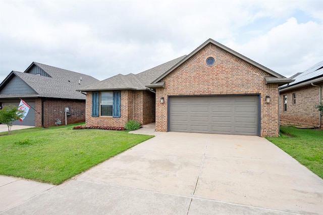 3529 NW 164th Ter, Edmond, OK 73013 - single story home featuring brick siding, an attached garage, and a front yard