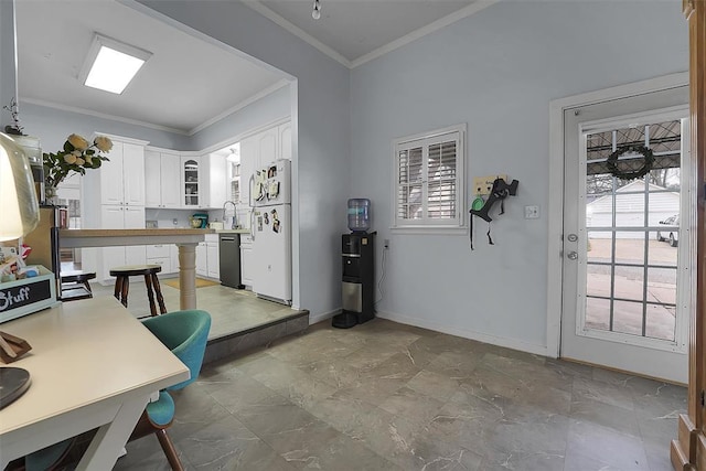 kitchen featuring sink, crown molding, dishwasher, white fridge, and white cabinets