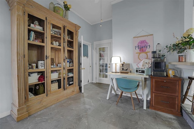 home office with crown molding and a towering ceiling