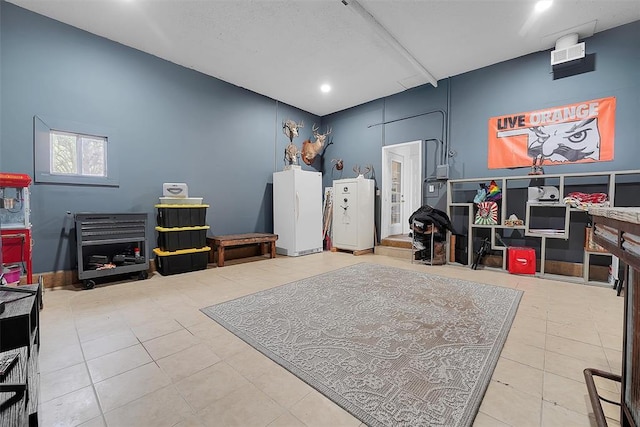 game room featuring tile patterned floors