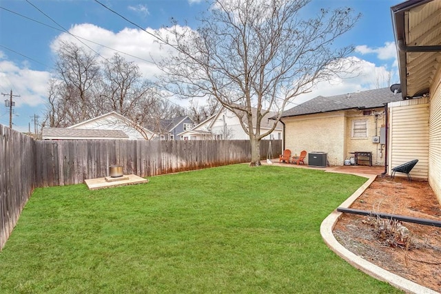 view of yard featuring a patio and cooling unit