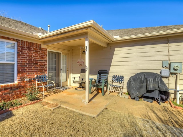 property entrance with a patio