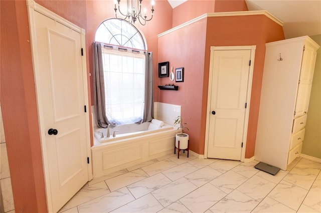 bathroom featuring a washtub, a notable chandelier, and lofted ceiling