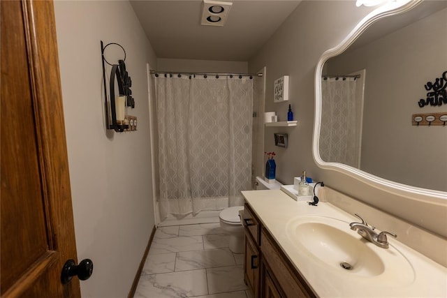 full bathroom featuring shower / bath combination with curtain, vanity, and toilet