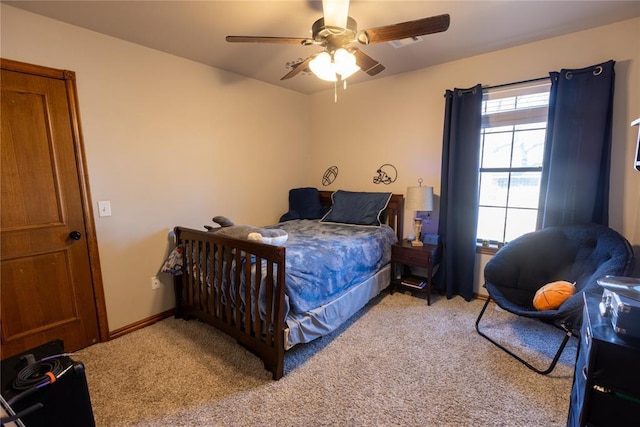 bedroom with light carpet and ceiling fan