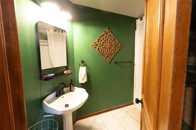 bathroom with sink and tile patterned floors