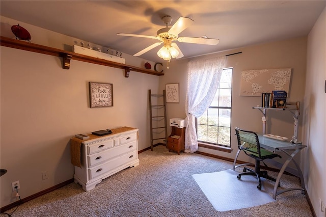 home office with light carpet and ceiling fan