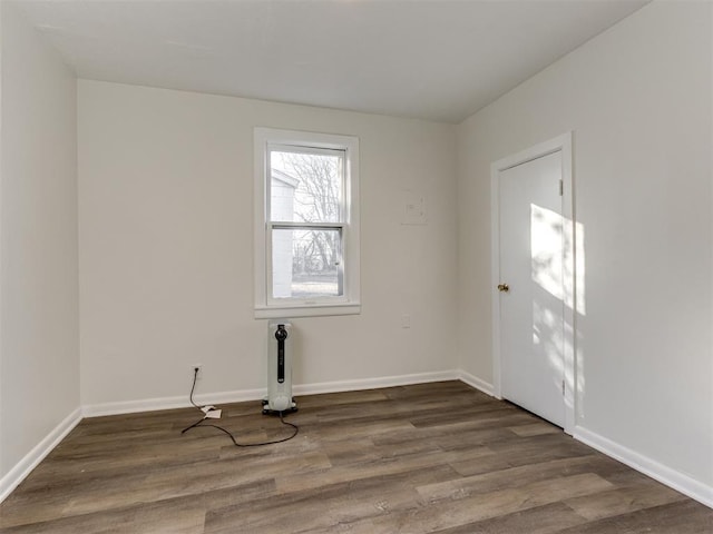 empty room featuring wood-type flooring