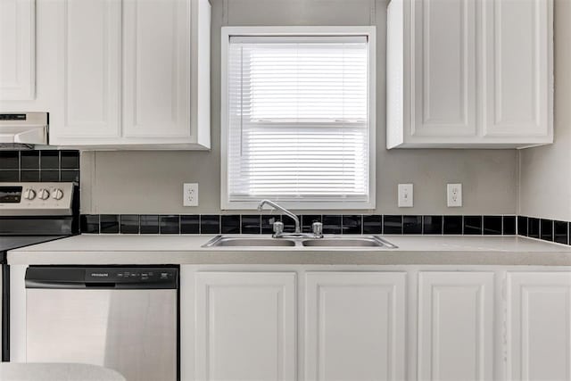 kitchen featuring sink, white cabinets, appliances with stainless steel finishes, and ventilation hood