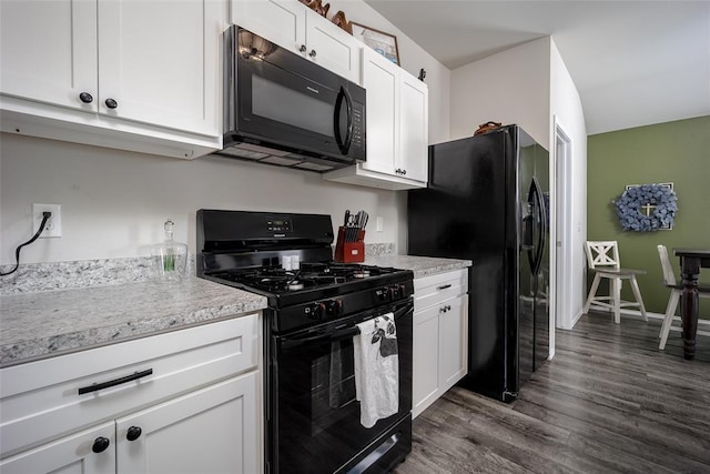 kitchen featuring black appliances, dark hardwood / wood-style floors, and white cabinets