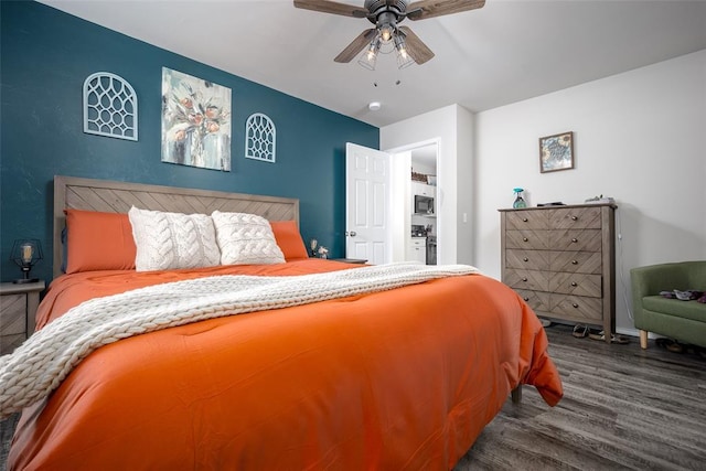 bedroom featuring ceiling fan and dark hardwood / wood-style flooring