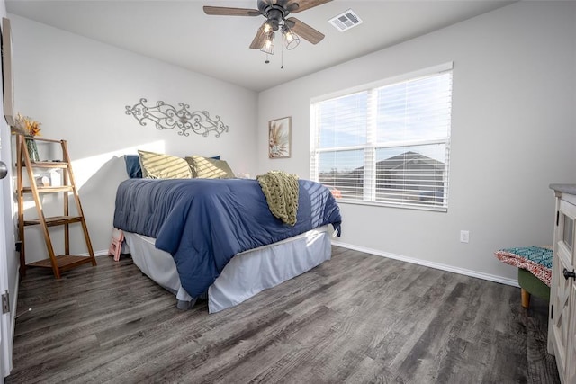 bedroom featuring dark wood-type flooring and ceiling fan