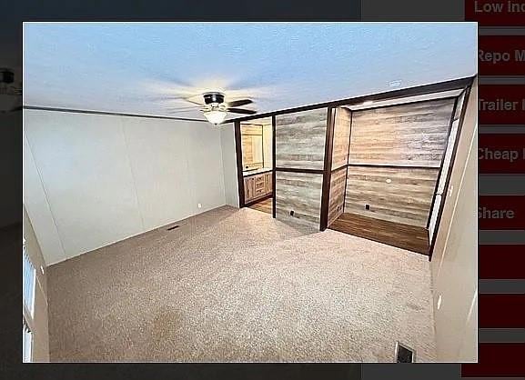 unfurnished bedroom with ceiling fan