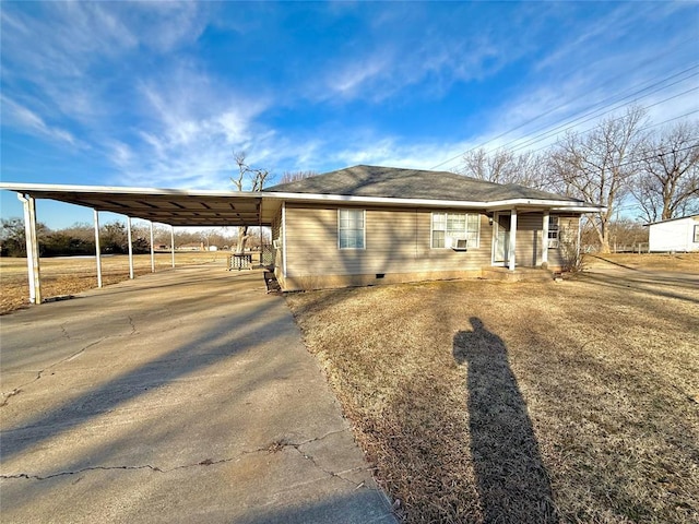 view of front of house with a carport