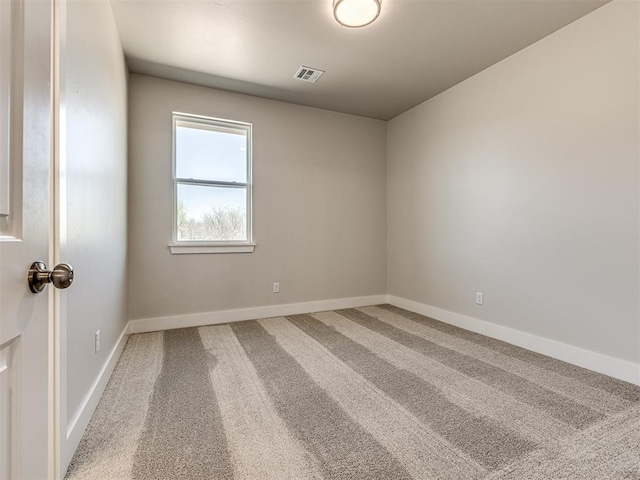 unfurnished room featuring carpet floors