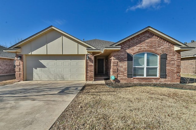 view of front of house with a garage and a front lawn