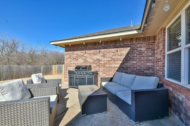 view of patio / terrace with an outdoor hangout area and grilling area