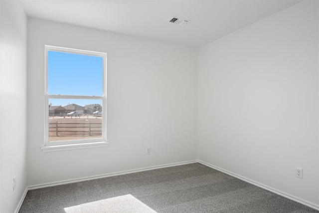 view of carpeted spare room