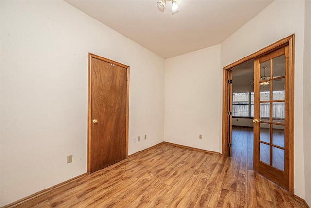 unfurnished room featuring light wood-type flooring