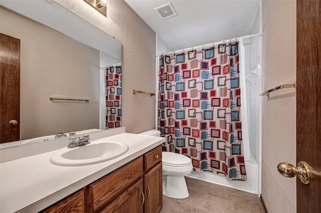 full bathroom with shower / bath combination with curtain, vanity, and toilet