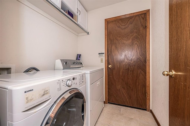 laundry room featuring washing machine and clothes dryer