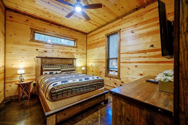 bedroom with ceiling fan, wooden ceiling, and wooden walls