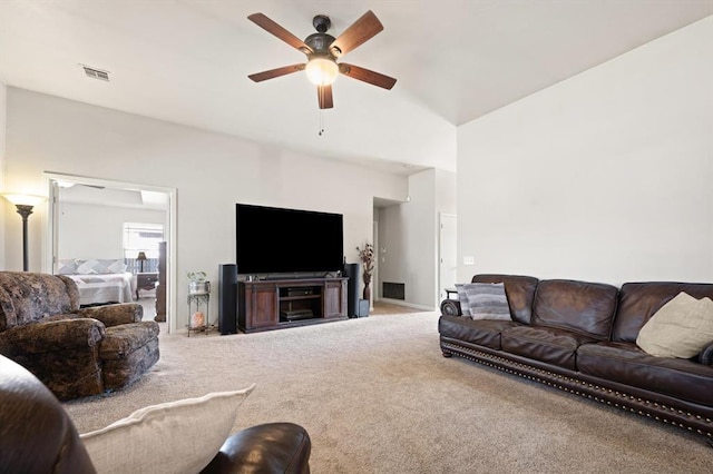 carpeted living room featuring ceiling fan