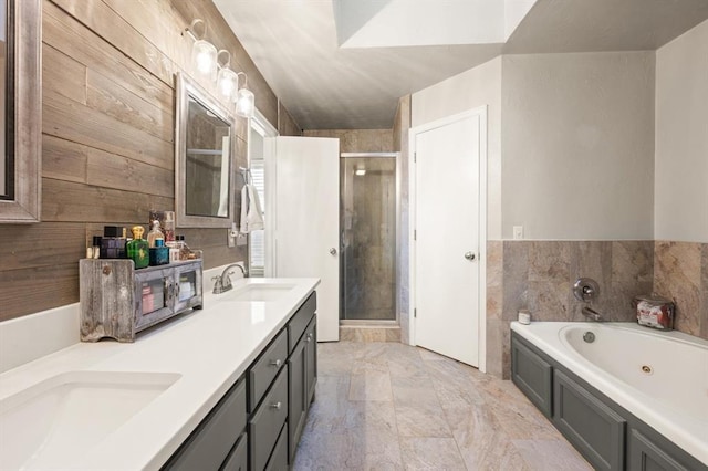 bathroom featuring plus walk in shower and vanity