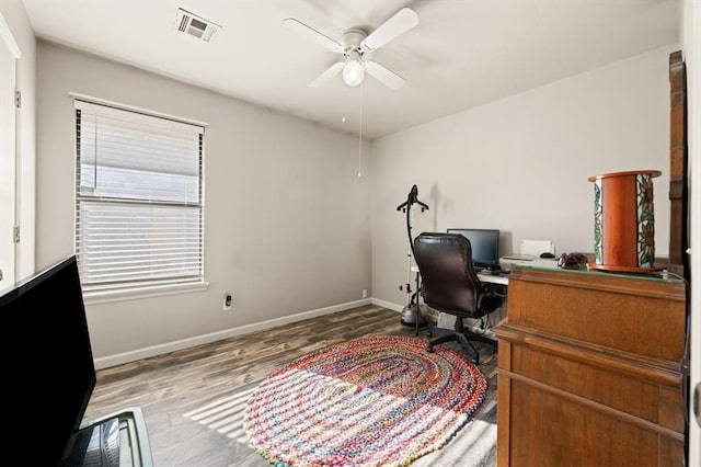 office space with hardwood / wood-style flooring and ceiling fan