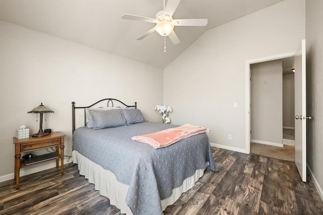 bedroom featuring dark wood-type flooring, ceiling fan, and lofted ceiling