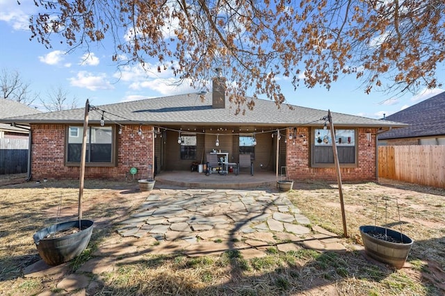 rear view of property with a patio area