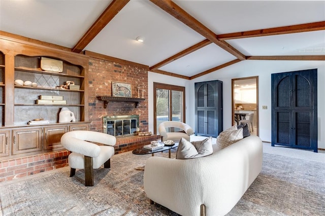 living room with a brick fireplace, carpet floors, and lofted ceiling with beams