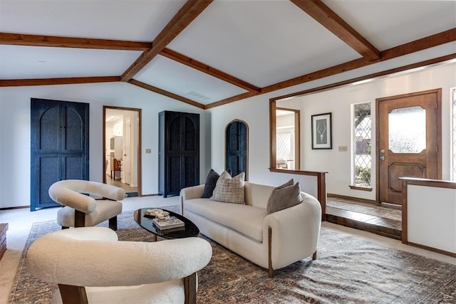 living room featuring carpet flooring and vaulted ceiling with beams