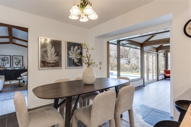 dining area featuring vaulted ceiling with beams and a notable chandelier