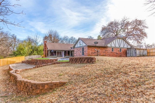 rear view of house featuring a patio area