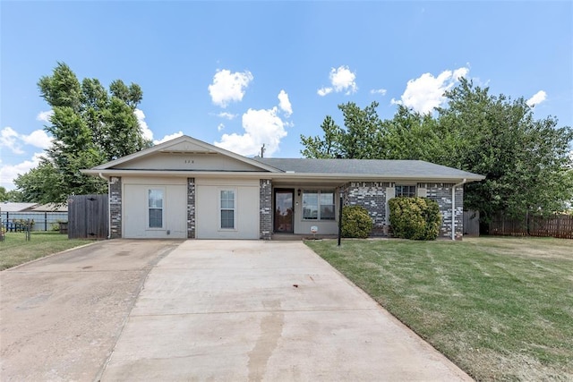 ranch-style house featuring a front lawn